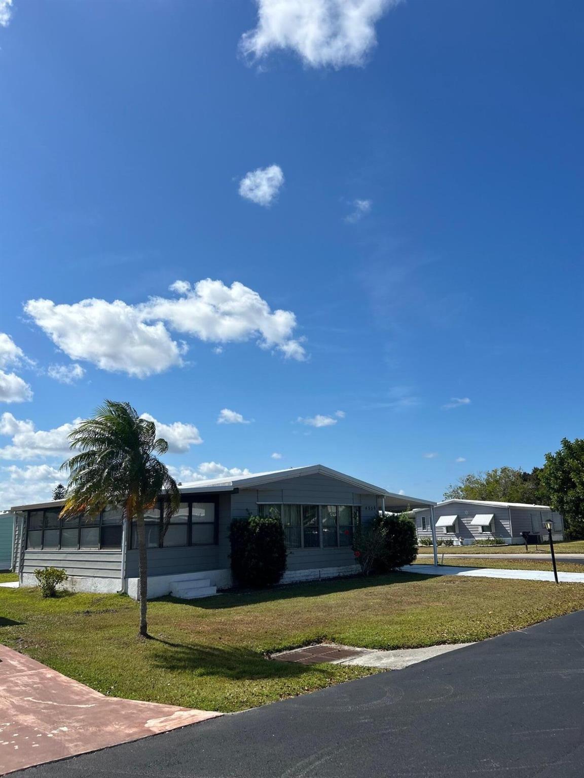 Great price in desirable 55+ community of Pinelake Gardens! This 2/2 home has plenty of space outside, with a screened in porch on one side of the home and a large Floride room on the other. Price to sell, come see this today!