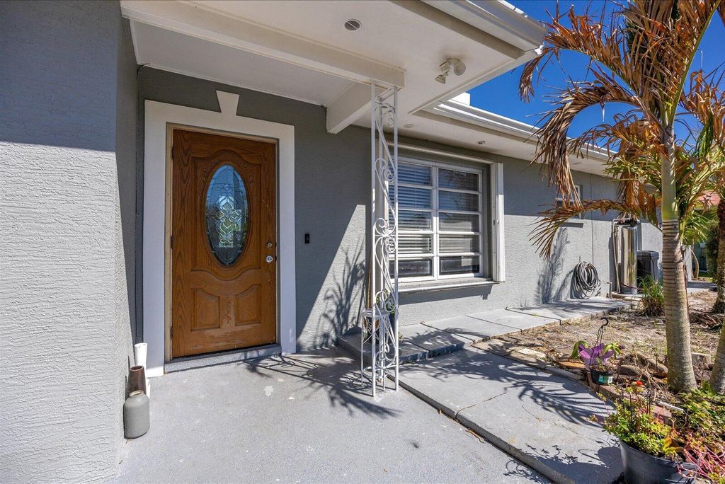 Photo of 403 NE Oleander Avenue, Port Saint Lucie, FL 34952 (MLS # B26005851)