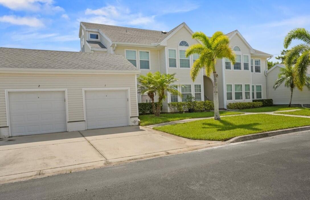Don't miss this great 3BR/2BA first floor condo! Convenient garage right next door! Built 2008. Attractive, eat-in kitchen with slider to side yard. AC 2017. HW 2019. Private 12x12 screened & tiled porch overlooks woods. Impact windows & sliders! Walk-in closets! Offered furnished. Beautiful community with lakes throughout, huge, heated pool, tennis/pickleball courts, racquetball court, fitness center, library, billiards, more! Located near shopping & restaurants, convenient to I-95 but only 8 miles from the beach!