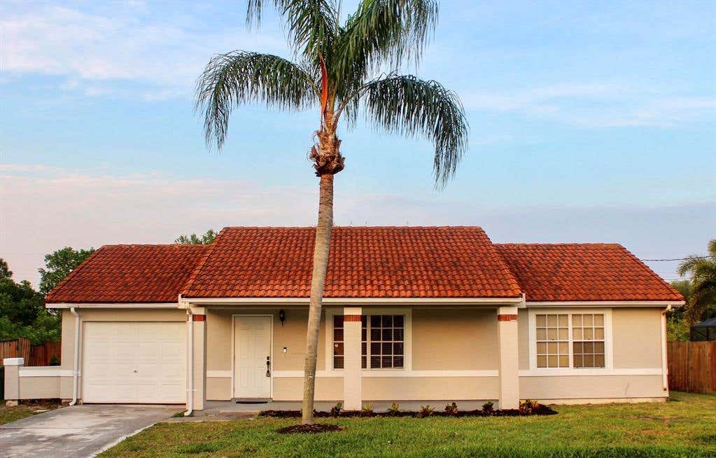 Photo of 1797 SW Hampshire Lane, Port Saint Lucie, FL 34953 (MLS # R10708616)