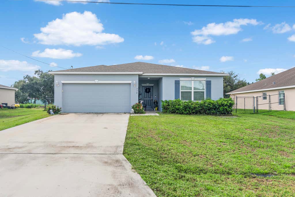 Photo of 574 SW Lacroix Avenue, Port Saint Lucie, FL 34953 (MLS # R11019995)