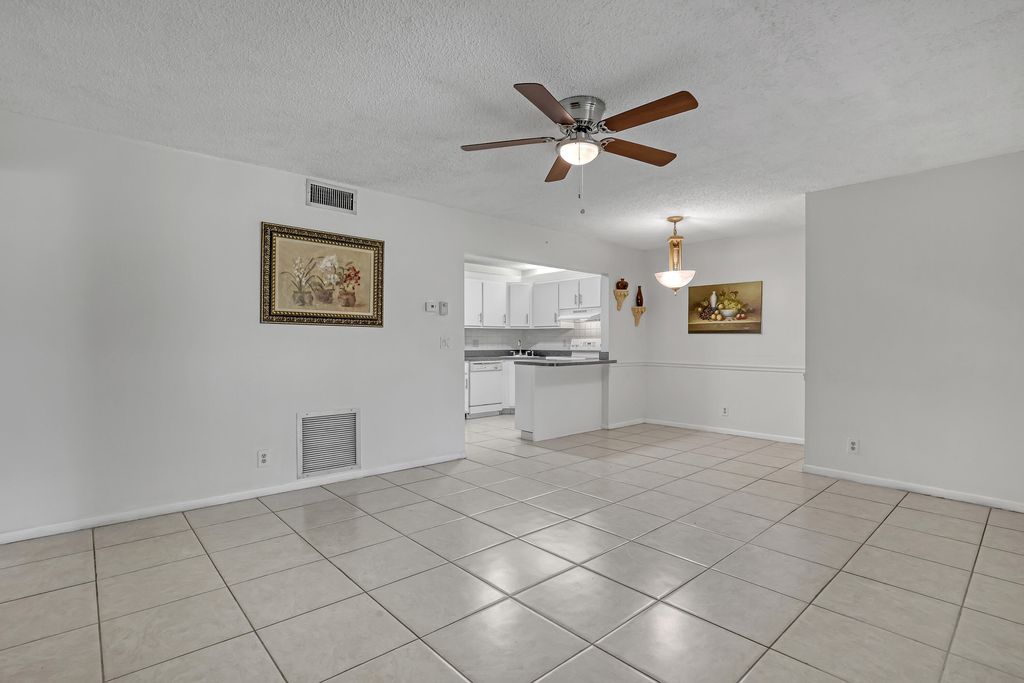 Photo of 436 Pine Glen Ln #C-2, Greenacres, FL 33463 (MLS # R11073644)