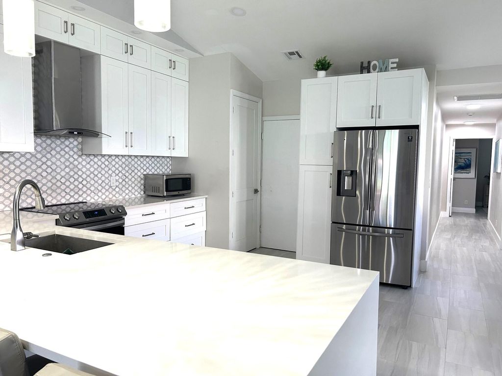 Photo of 6114 Heliconia Road, Delray Beach, FL 33484 (MLS # R11020512)