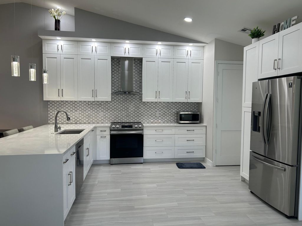 Photo of 6114 Heliconia Road, Delray Beach, FL 33484 (MLS # R11020512)