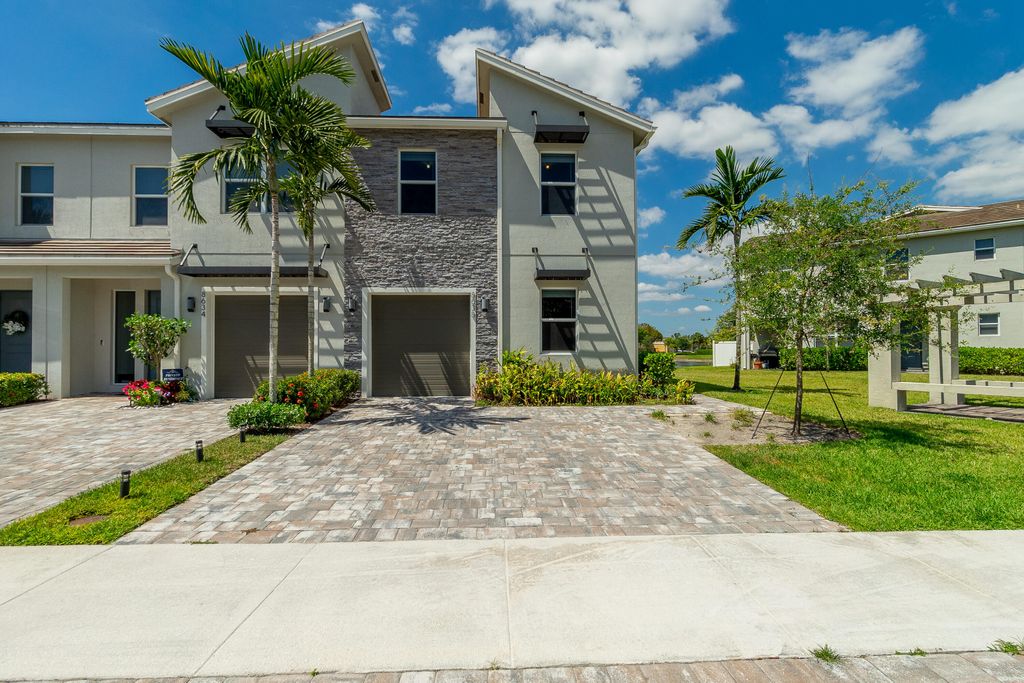 Photo of 8618 Via Mar, Lake Worth, FL 33467 (MLS # B26010910)