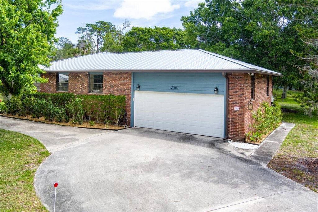 Photo of 2304 S Canoe Creek Lane, Fort Pierce, FL 34981 (MLS # R11120829)