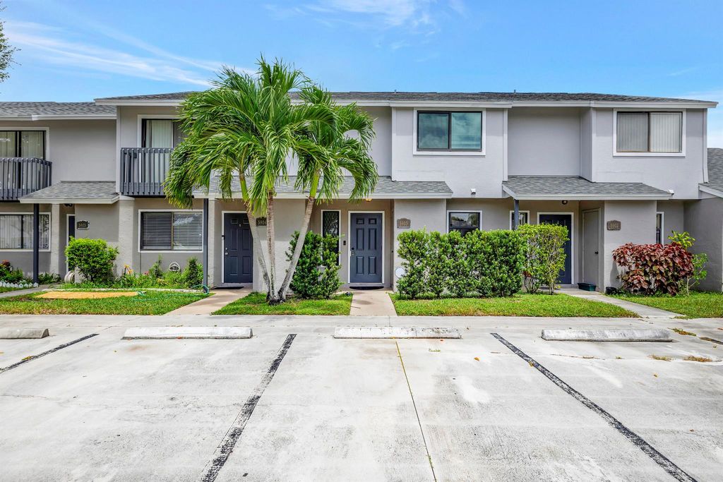 Photo of 5903 Channel Drive, Greenacres, FL 33463 (MLS # R10914279)