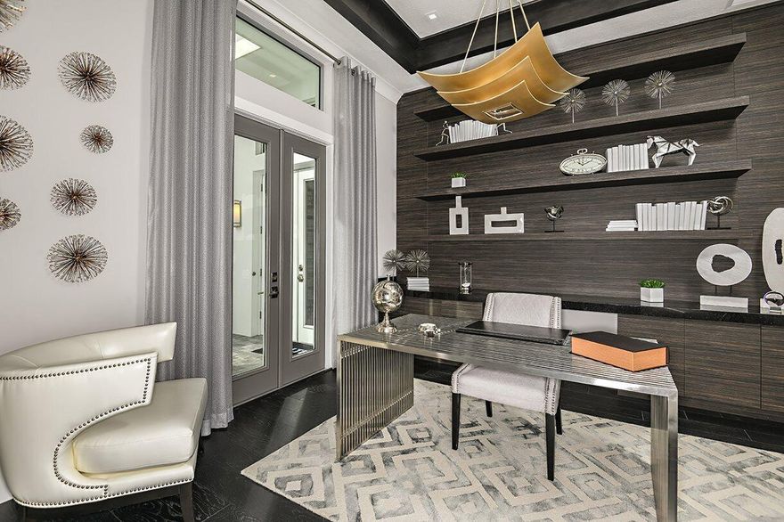 Former Alton Model!  Best location in Alton Contemporary home complete with designer selected finishes and decor.Best location in Alton no noise from 95 and close to Town center and club house . A large island with 3''quartz countertops and waterfall edge, 36'' gas on glass cooktop, 30'' wall oven and built-in microwave, wine reserve and two dishwashers completes the Kitchen. Owner's Suite offers a sitting area overlooking the covered balcony, oversized frameless glass shower, freestanding tub, private balcony and private Gym.Family Casita situated on the second floor is perfect for extended family ,guests or teenager, offering an additional entertainment area, bedroom and bathroom. Over loaded with upgrade.Pool and spa.