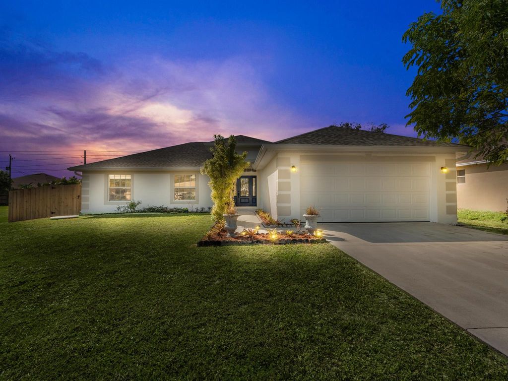 Photo of 2350 SW Cooper Lane, Port St Lucie, FL 34984 (MLS # R10938265)