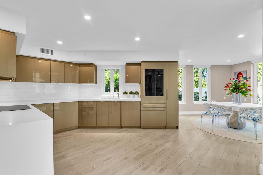 This rarely available Pet-Friendly, walk-out garden unit offers the feeling of a private single-family residence with the amenities of Mizner Court. Lush greenery surrounds the home, and two covered patios lead directly to the Intracoastal promenade, community pools, and The Boca Raton.Completed in early 2022, this residence underwent a full-scale reconstruction, taken to the studs with a reimagined open floor plan, raised ceilings, all-new HVAC and ductwork, hurricane-impact glass throughout, upgraded plumbing and electrical, and a whole-unit water filtration system. Every finish and detail was intentionally selected and executed to a refined standard.