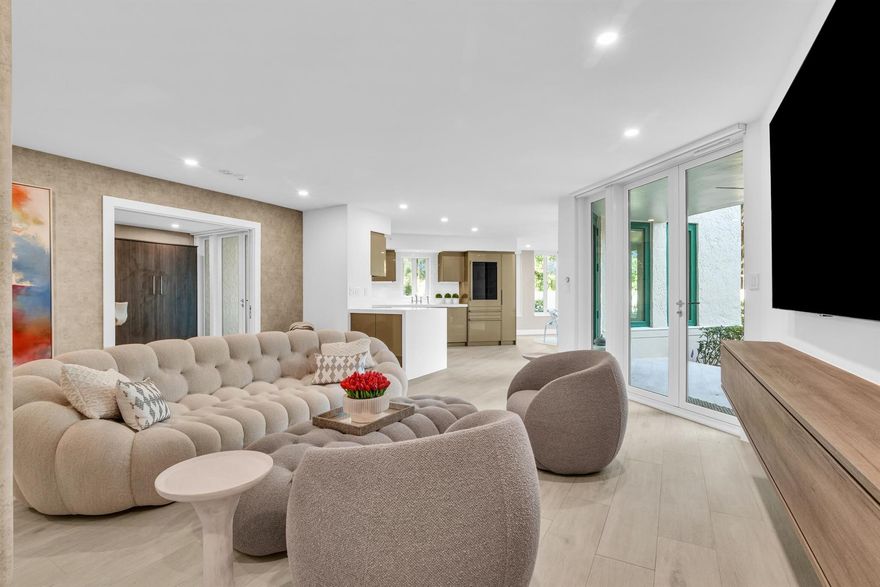 This rarely available Pet-Friendly, walk-out garden unit offers the feeling of a private single-family residence with the amenities of Mizner Court. Lush greenery surrounds the home, and two covered patios lead directly to the Intracoastal promenade, community pools, and The Boca Raton.Completed in early 2022, this residence underwent a full-scale reconstruction, taken to the studs with a reimagined open floor plan, raised ceilings, all-new HVAC and ductwork, hurricane-impact glass throughout, upgraded plumbing and electrical, and a whole-unit water filtration system. Every finish and detail was intentionally selected and executed to a refined standard.