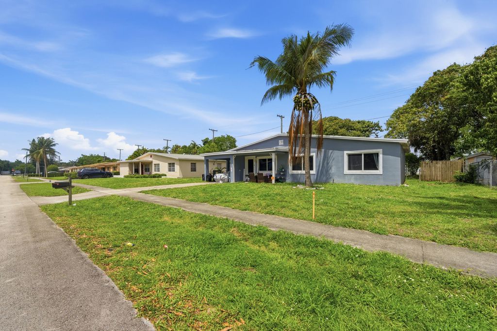 Photo of 3821 NW 4th Place, Lauderhill, FL 33311 (MLS # B26011686)