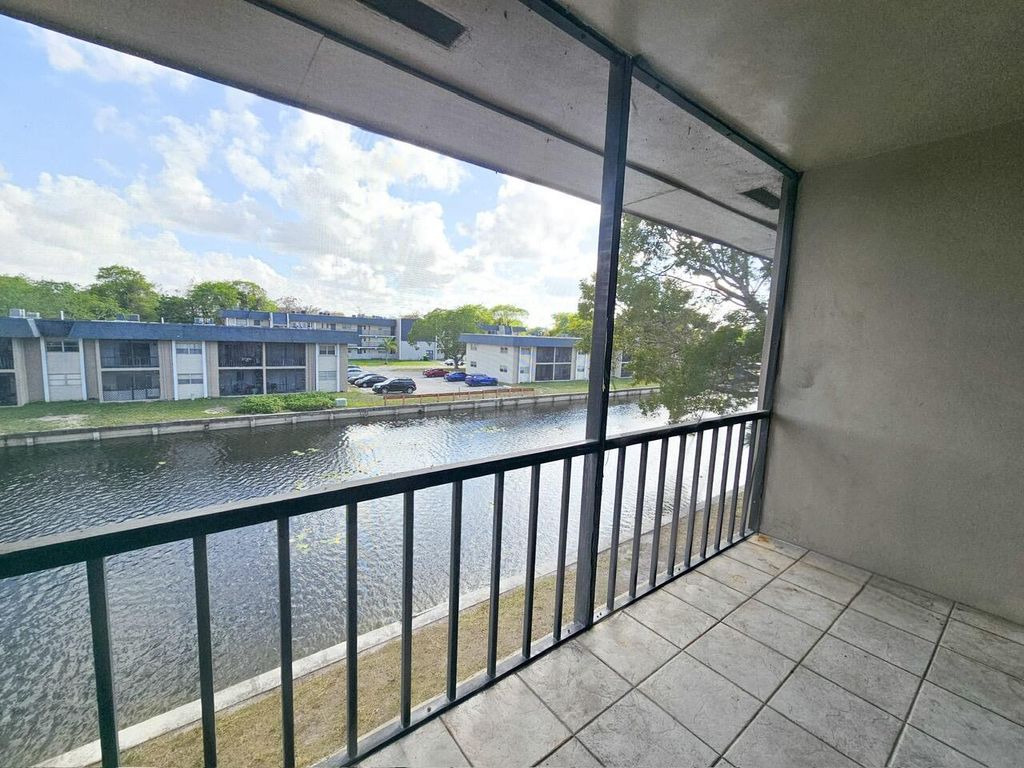 Photo of 7960 Colony Circle N #305, Tamarac, FL 33321 (MLS # R11168951)