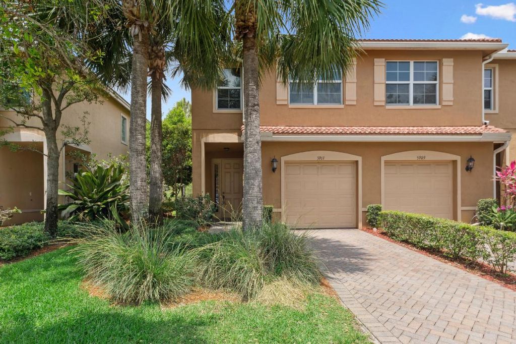Photo of 5911 Monterra Club Drive, Lake Worth, FL 33463 (MLS # R11125175)