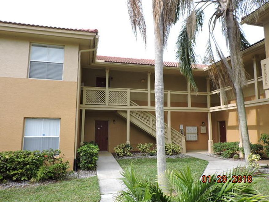 Looking for starter home or investment this ground floor large one bedroom unit is ready for your personal touches.  Open floor plan with bar seating to kitchen, screen patio with wide views of lake and short walk to community clubhouse, gym and pool. Central location that is close to everything.  Don't miss out on this opportunity.