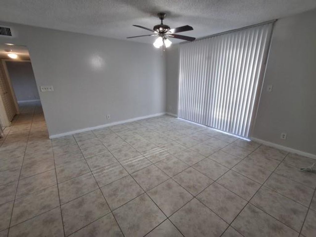 Photo of 741 Lyons Road #17-106, Coconut Creek, FL 33063 (MLS # F10536936)