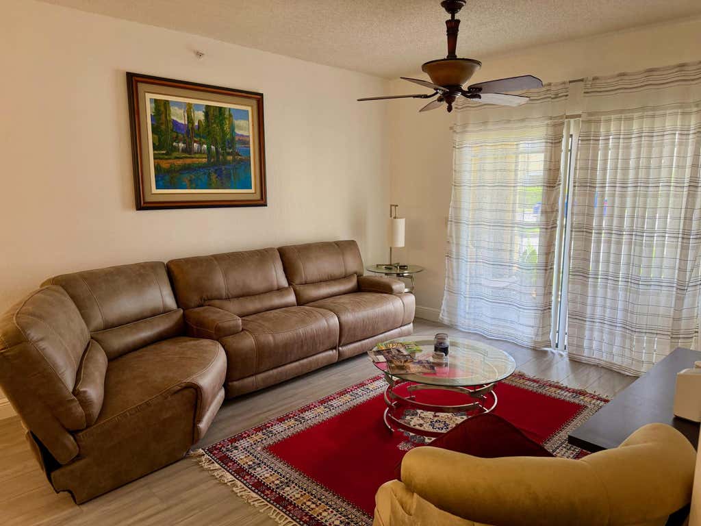 Photo of 3018 Alcazar Place #101, Palm Beach Gardens, FL 33410 (MLS # B26044934)