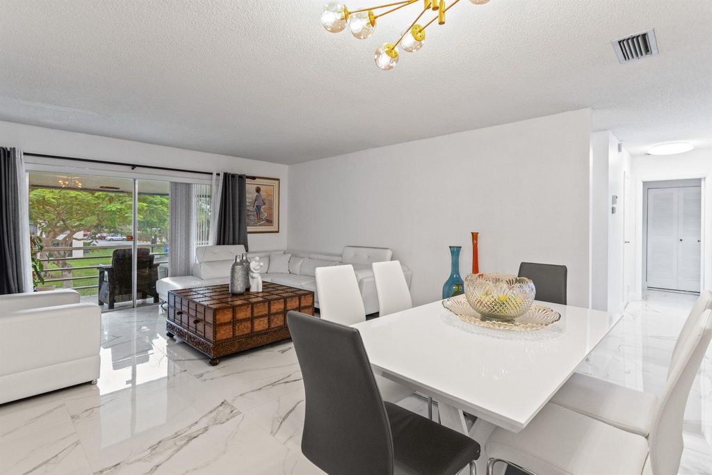 Photo of 335 W Laurel Drive #8m, Margate, FL 33063 (MLS # R11146948)