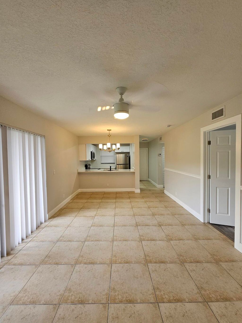 Photo of 1421 Windorah Way #E, West Palm Beach, FL 33411 (MLS # B26023352)