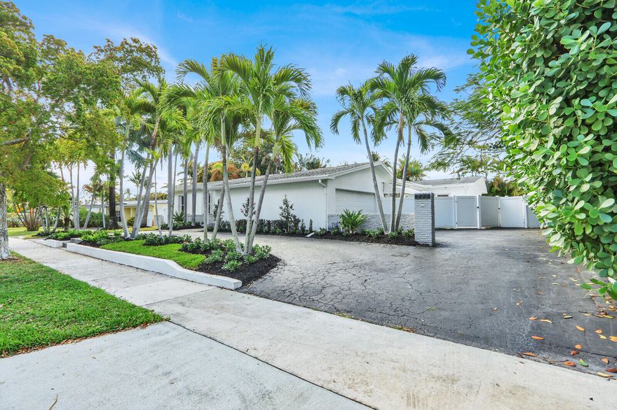 Experience this stunning single-story home with 3,428 sq. ft. on an 11,326 sq. ft. lot. Featuring 4 bedrooms, 3 baths, and a 2-car garage, this home boasts wood floors, high ceilings, a heated pool, natural gas, and an updated kitchen with Sub-Zero appliances. Don't miss this gem in a prime Palm Beach County location!