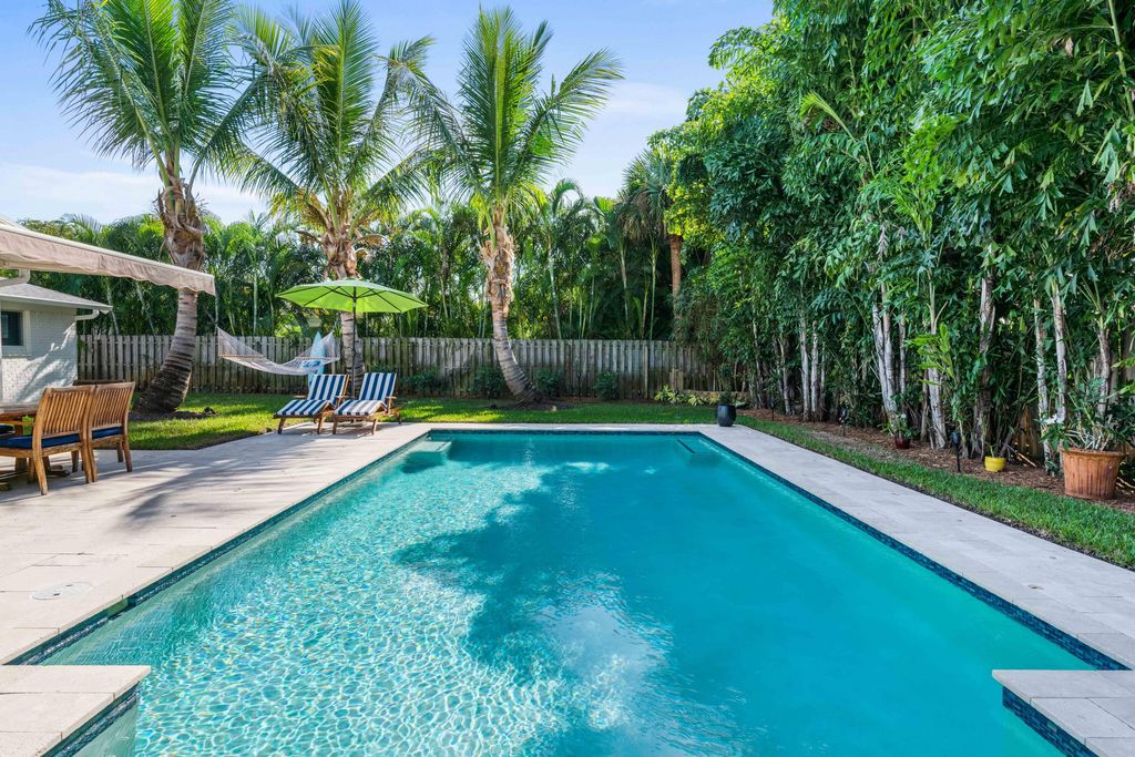 Photo of 747 Tradewind Drive, North Palm Beach, FL 33408 (MLS # R10857300)