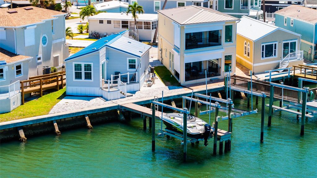 Photo of 13 Nettles Boulevard, Jensen Beach, FL 34957 (MLS # F10435241)