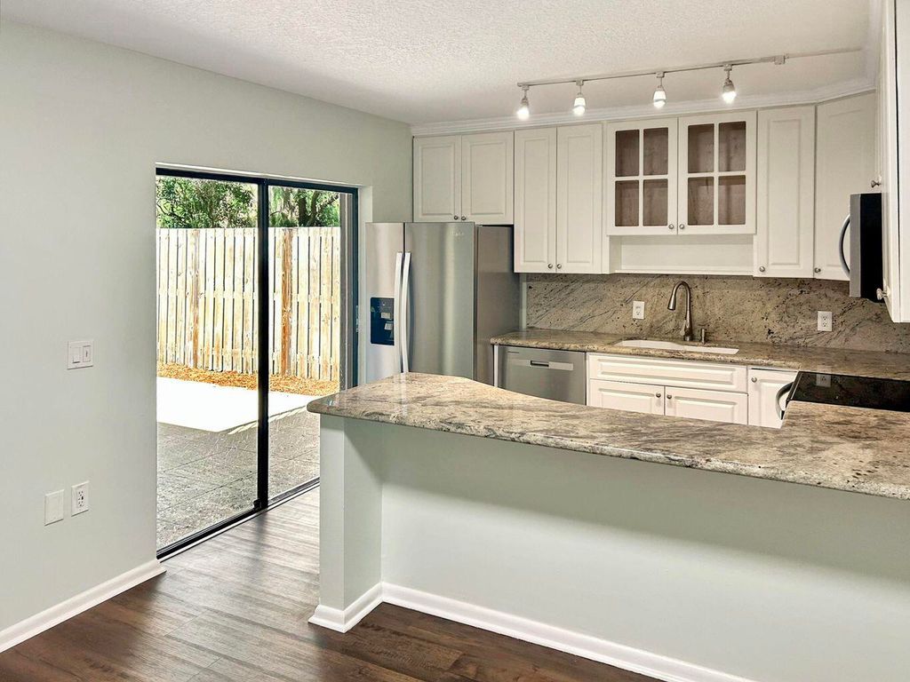 Photo of 405 4th Lane, Palm Beach Gardens, FL 33418 (MLS # R11091391)