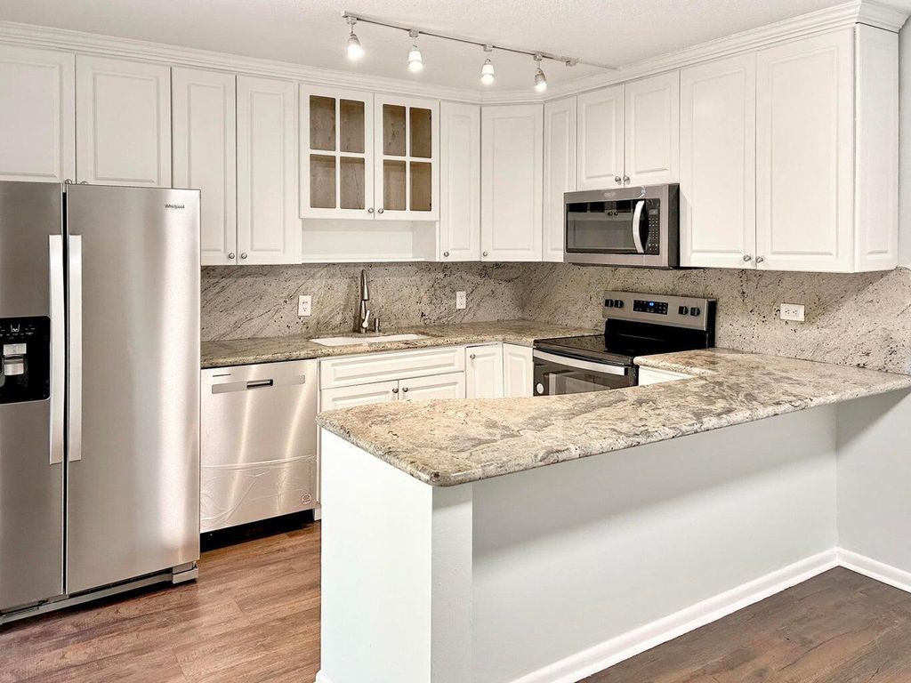 Photo of 405 4th Lane, Palm Beach Gardens, FL 33418 (MLS # R11091391)