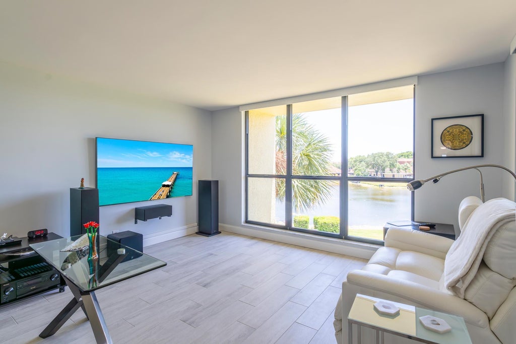 Photo of 5344 Woodland Lakes Drive #321, Palm Beach Gardens, FL 33418 (MLS # R10992158)