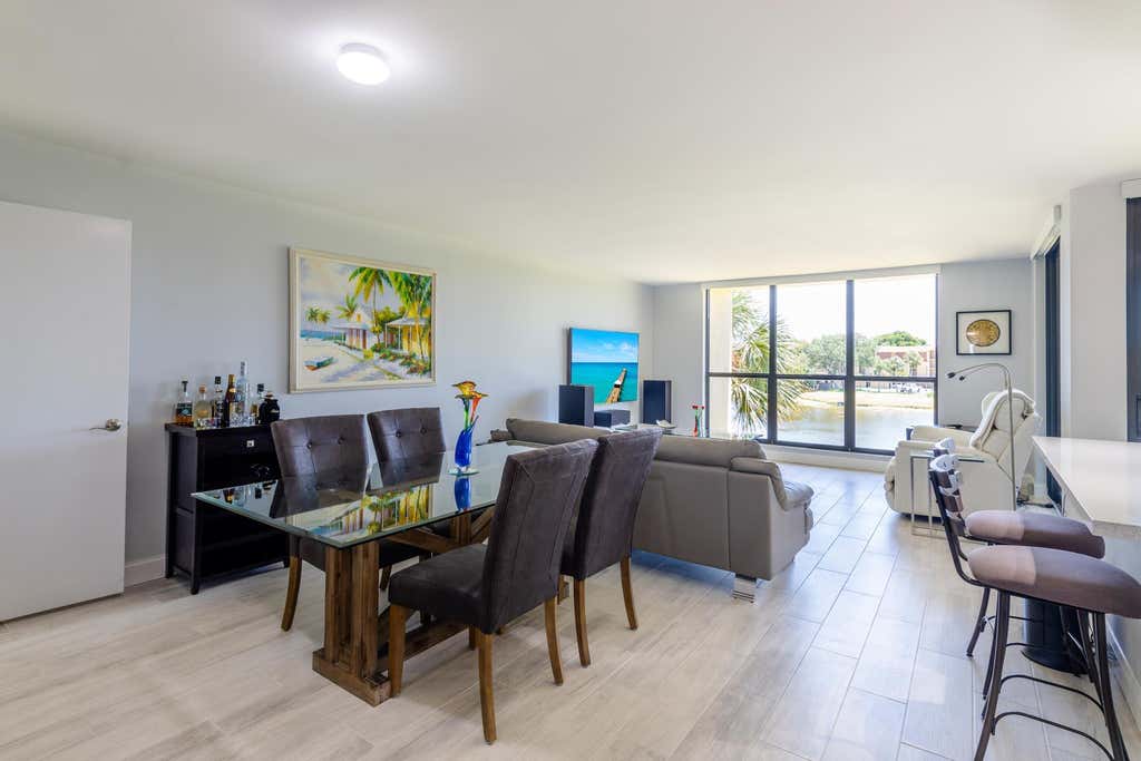Photo of 5344 Woodland Lakes Drive #321, Palm Beach Gardens, FL 33418 (MLS # R10992158)