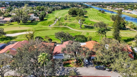 Photo of 661 Hollows Circle, Deerfield Beach, FL 33442 (MLS # F10546100)