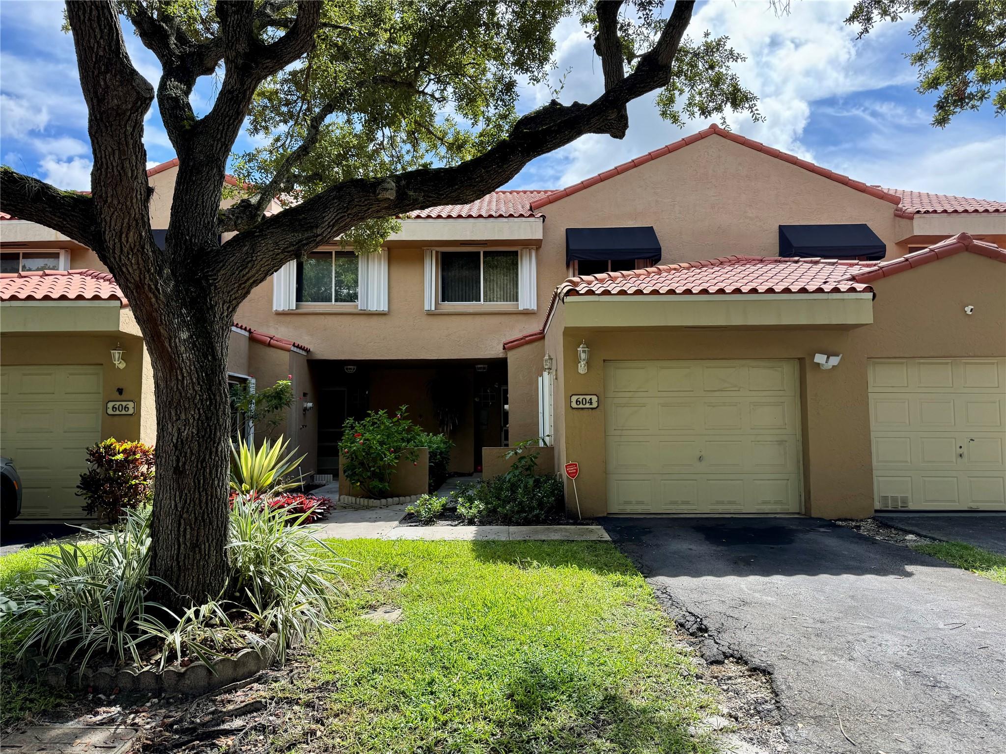 Perfectly located in the heart of Plantation, this 3-bedroom, 2.5-bath townhouse sits right across from the new Plantation Walk, offering easy access to shops, dining, and entertainment. The home features a carport garage and a spacious layout, with community amenities including a pool.