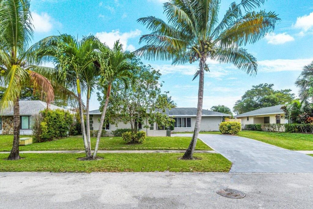 Photo of 208 Lochmore Road, Riviera Beach, FL 33407 (MLS # R10950792)