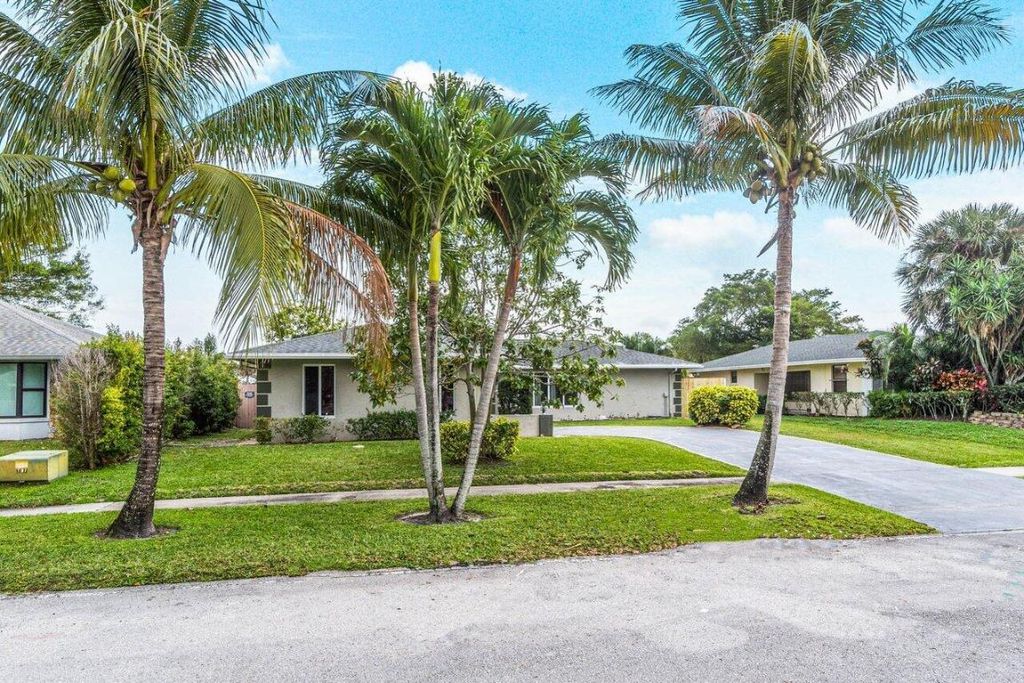 Photo of 208 Lochmore Road, Riviera Beach, FL 33407 (MLS # R10950792)