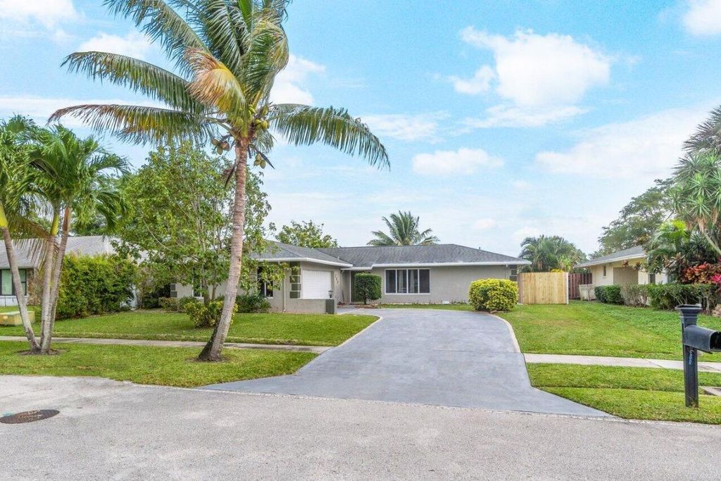 Photo of 208 Lochmore Road, Riviera Beach, FL 33407 (MLS # R10950792)