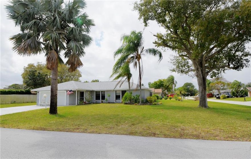 HUGE CORNER LOT, BEAUTIFUL POOL ENCLOSURE WITH HEATED JACUZZI AND POOL . BRAND NEW ROOF. 3 BEDROOM 2 BATHS AND 2 CAR GARAGE. FANTASTIC FLORIDA ROOM, SHED AND MORE.DESIRABLE JENSEN PARK BEACH ESTATES. VERY LOW HOA MAINT.