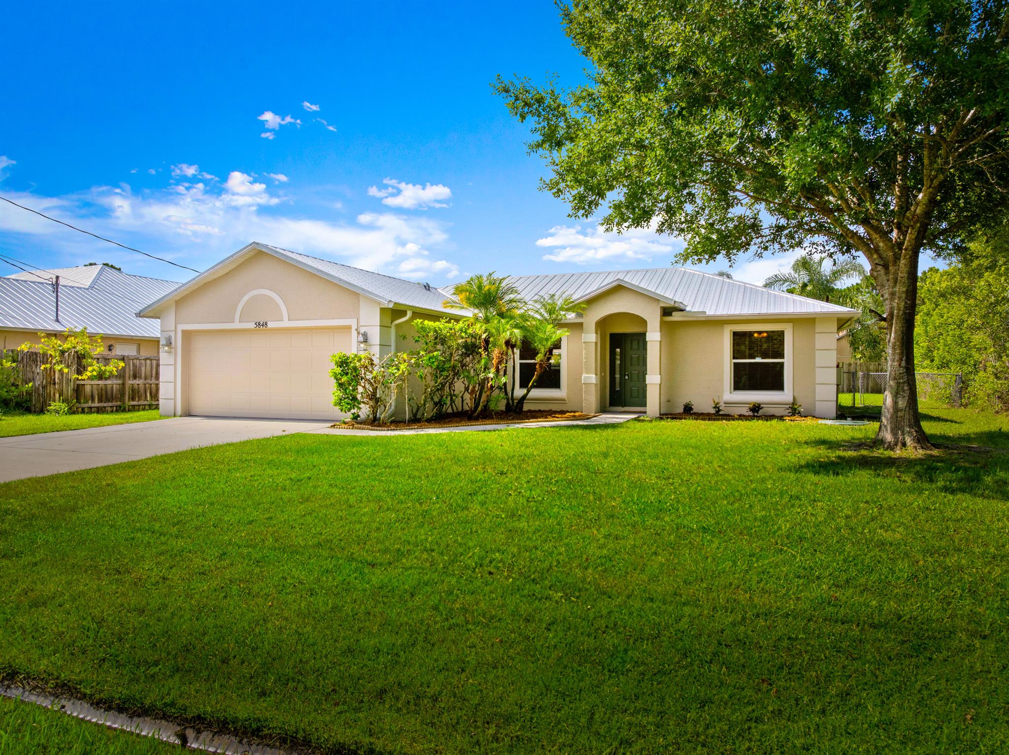 Updated 3/2/2 CBS home located in the quiet desirable St. Lucie West/ Torino area just minutes away from Mets Stadium and a wide selection of shops and restaurants. Offering a spacious split bedroom open floor plan, newer metal roof, updated appliances, ceramic tile throughout, updated en-suite bathroom, screened back porch and a fenced yard. Schedule a showing today.