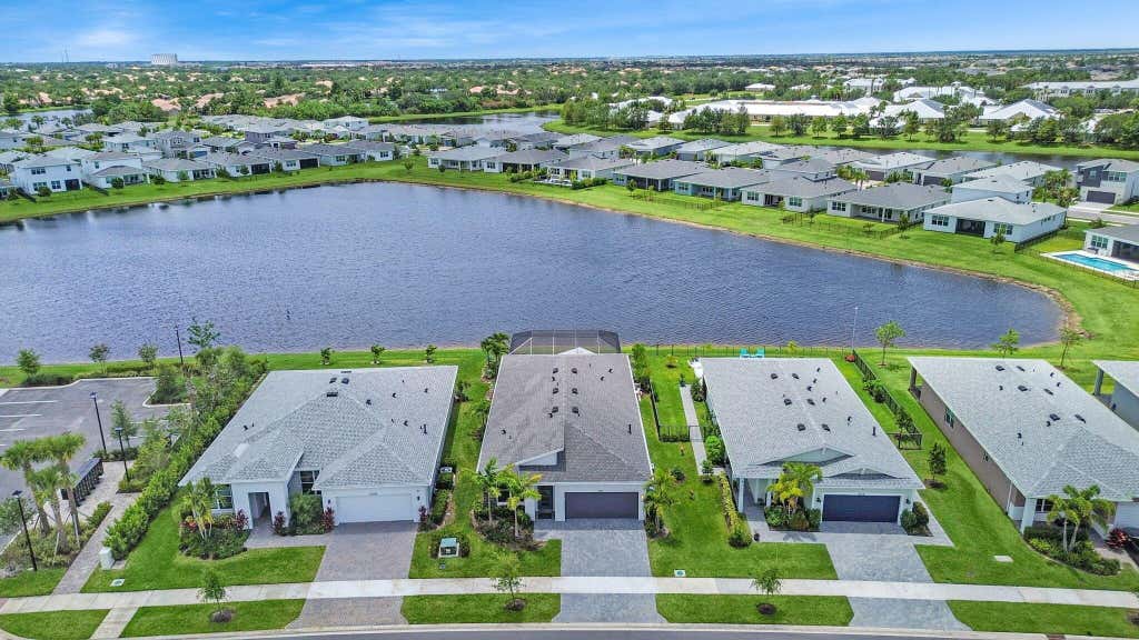Photo of 10711 SW Hensley Street, Port Saint Lucie, FL 34987 (MLS # R10999069)