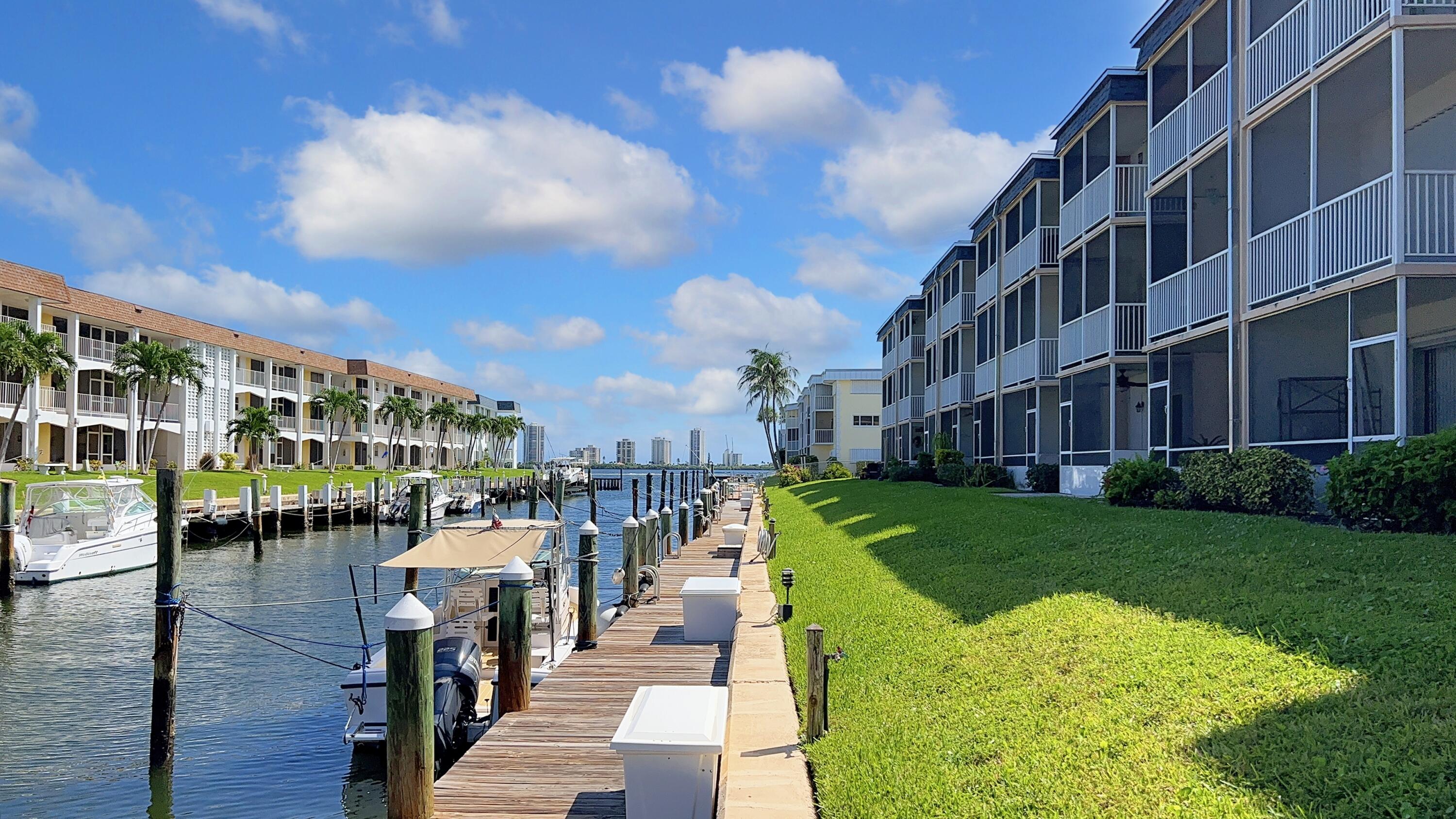 Annual Lease Available September 1st!! Welcome to Lake Colony 55+ Community! This cozy, unfurnished 2BR/2BA, 3rd floor end unit is a hidden gem in this active, 55+ waterfront community in North Palm Beach. This rental has new vinyl flooring, remodeled kitchen with granite counters, SS appliances, impact windows, doors & sliders, new paint throughout and is move-in ready to enjoy breathtaking morning sunrises and evening skyline views of Singer Island. You will LOVE the beautiful intracoastal breezes off your master bedroom screened in double balcony! Enjoy grilling out by the pool with friends and family while watching the boats go by on the intracoastal waterway. You are minutes away to 5 star restaurants,