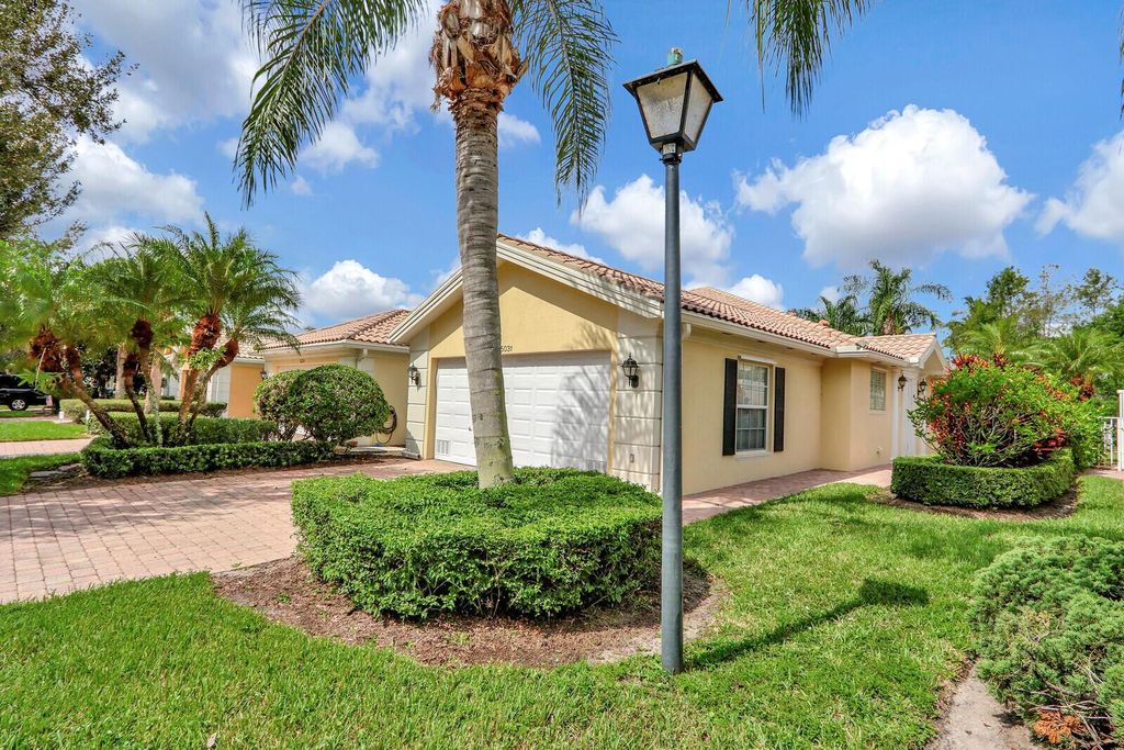 Photo of 5031 Magnolia Bay Circle, Palm Beach Gardens, FL 33418 (MLS # R10886224)
