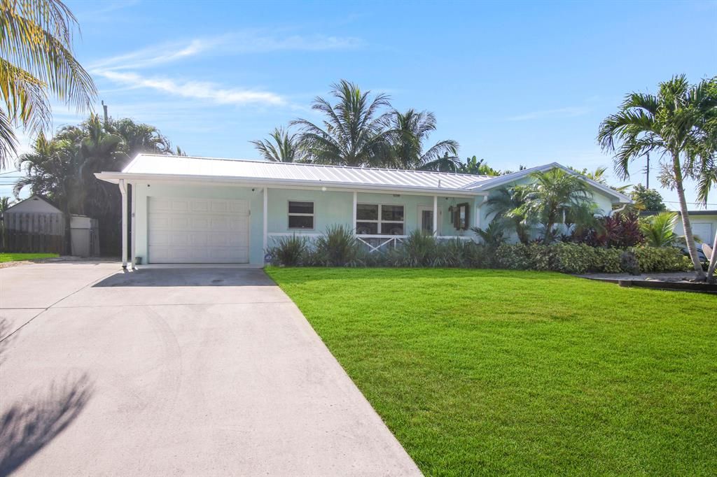 Photo of 1507 N Venus Avenue Ave, Jupiter, FL 33469 (MLS # R10810049)