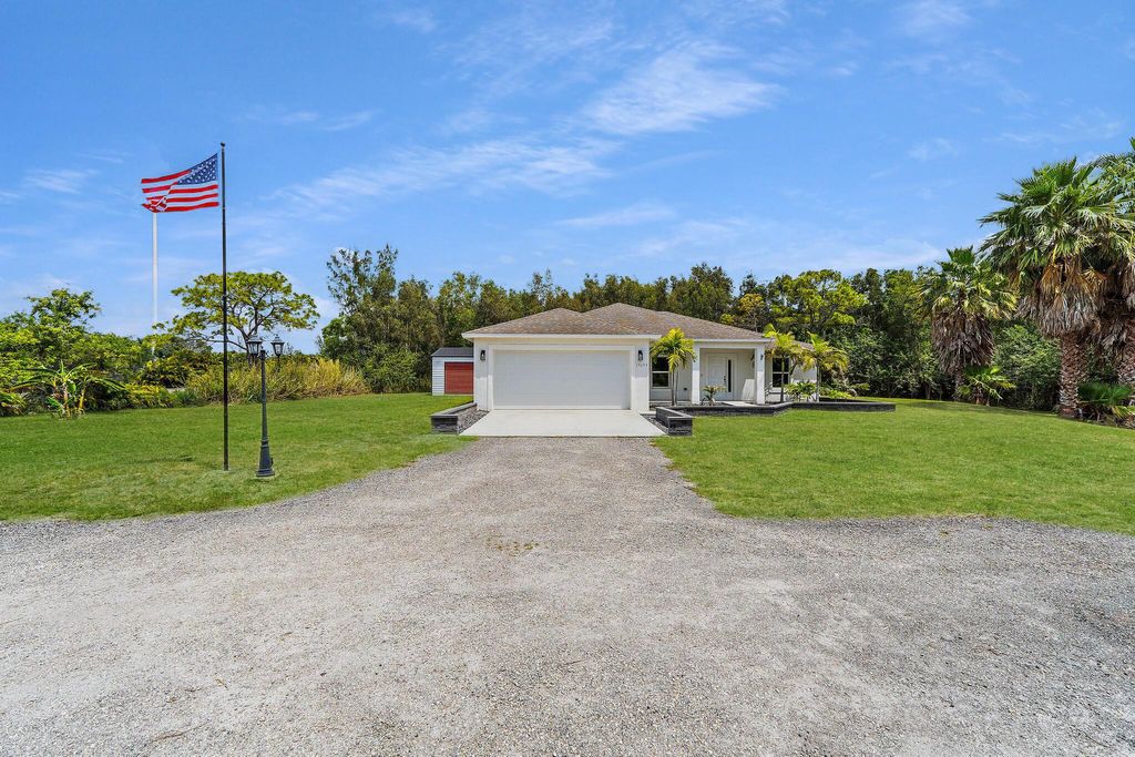 Photo of 15693 Hamlin Boulevard, The Acreage, FL 33470 (MLS # R11100740)