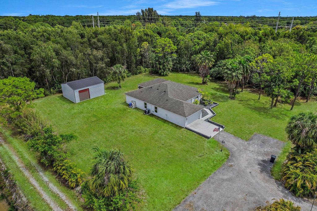 Photo of 15693 Hamlin Boulevard, The Acreage, FL 33470 (MLS # R11100740)