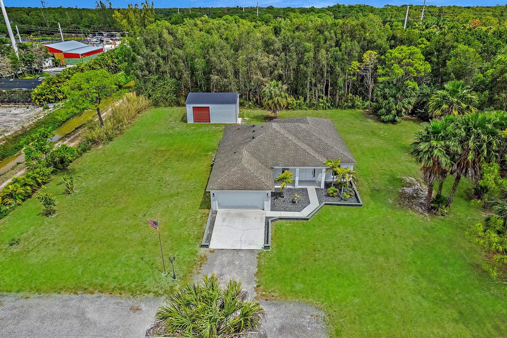 Photo of 15693 Hamlin Boulevard, The Acreage, FL 33470 (MLS # R11100740)