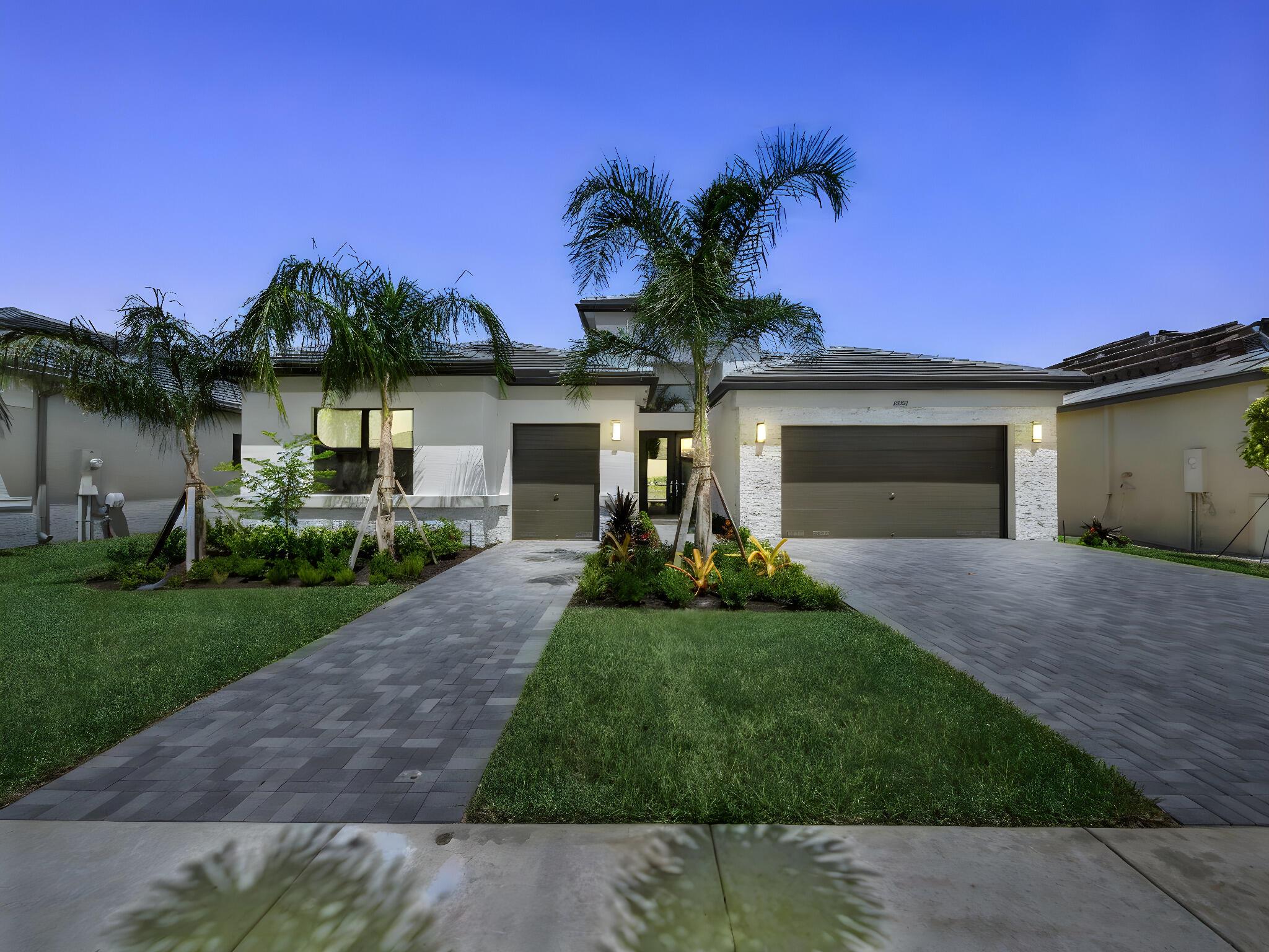 Builder closeout special, call the builder for full details. Valencia Parc at Riverland is where you'll find Port St. Lucie's best 55+ lifestyle with a million ways to have fun including a beautiful 38,000-square foot Clubhouse with resort-style amenities. This Bianca floorplan includes water views, custom pool, and an open floor plan with wood plank tile flooring throughout the main living areas. All bedrooms include designer plush carpet. The home features high end finishes including impact glass windows, GE gas appliances, tile roof, and recessed LED lighting. The spacious kitchen includes high end designer granite countertops with full backsplash, painted gray mist maple cabinets, and GE stainless-steel appliances with canopy hood.