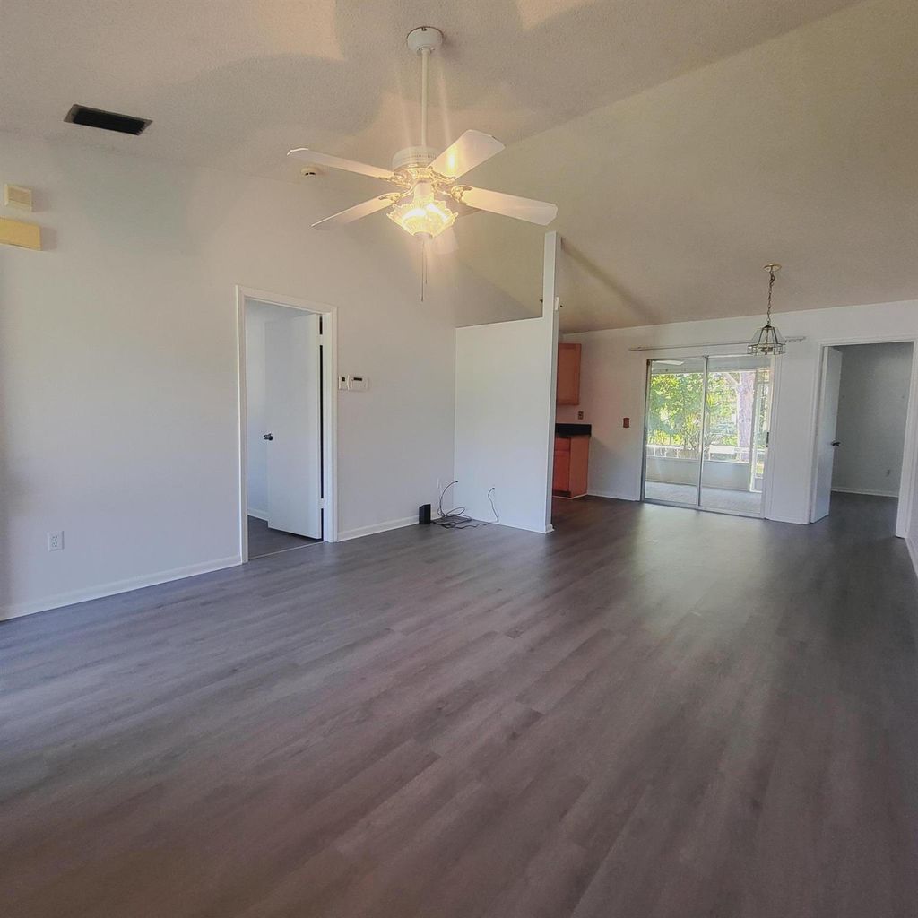 Photo of 719 SW Arkansas Terrace, Port Saint Lucie, FL 34953 (MLS # R11013499)