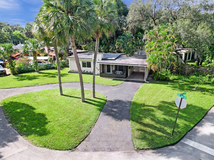 Immaculate home in sought after Shady Banks. Why Pay over $3,000/month to rent a 1 Bedroom Apt when you can put your money toward OWNING A HOME! Large corner lot, all new tile flooring, new kitchen cabinets/counters, beautiful new bathroom. Separate Den, Guest Room or Home Office off the Living Room. Impact windows/doors. Freshly painted. Room to expand. Screened porch, Carport. Mini split AC systems keeps electric bills low. French doors in the kitchen & bedroom open to back yard. Located minutes to downtown, Las Olas & the Beach. Hidden gem with one way in/out, surrounded by the New River, no through traffic. 2 parks: Hortt park, 5 acres with tennis, volleyball walking paths, playground, exercise equipment. Bill Kieth Preserve on the River with shoreline, walking trails, picnic area.