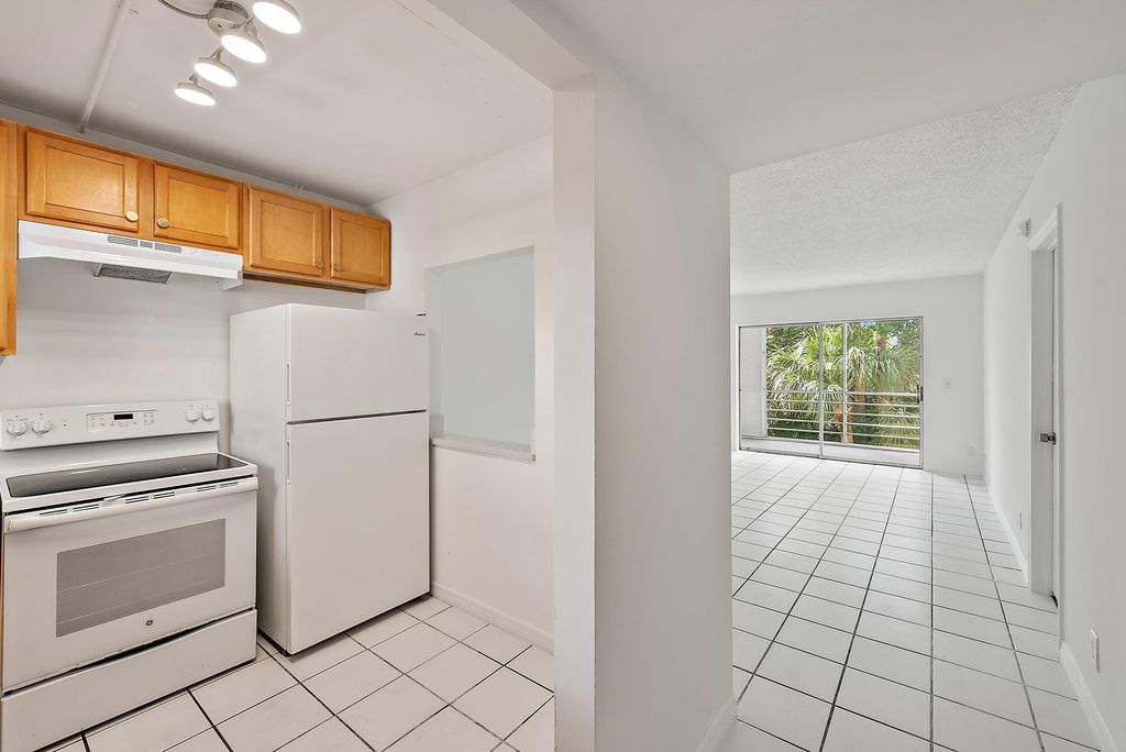 Photo of 1638 Embassy Drive #306, West Palm Beach, FL 33401 (MLS # R11075865)