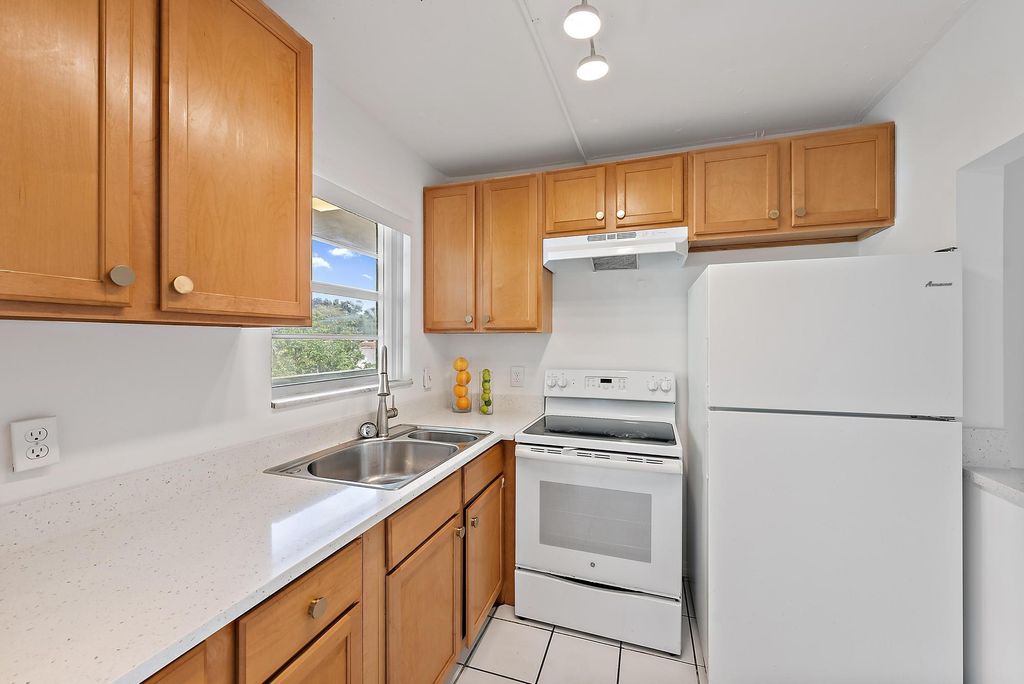 Photo of 1638 Embassy Drive #306, West Palm Beach, FL 33401 (MLS # R11075865)