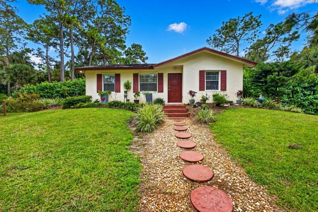 Photo of 9242 166TH Way N, Jupiter, FL 33478 (MLS # B26092324)